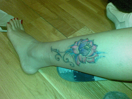 tribal flower tattoos. Tribal flower ideas legs