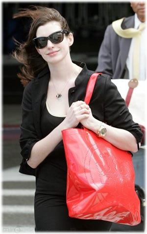Anne Hathaway Looks Casual with Tory Burch Bag