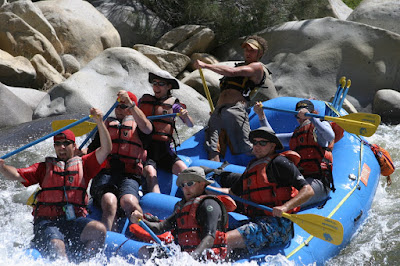 Sweep Boat enters a Rapid