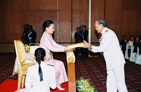 HRH presenting Tipitaka volume to Patrons of Dhamma Society to be handed over in India, Japan and Sweden, 2007 