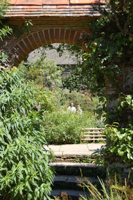 Archway to pond garden