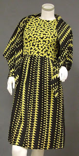 A bold Sarmi vintage dress in two different black and yellow printed crepes.