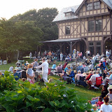 Folks settling in for a performance at the Newport Art Muesum