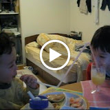 Eidan tries out Kai's mega-straw
