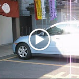 A car being blessed at the Fukagawa Fudoson temple, which specializes in car safety rituals