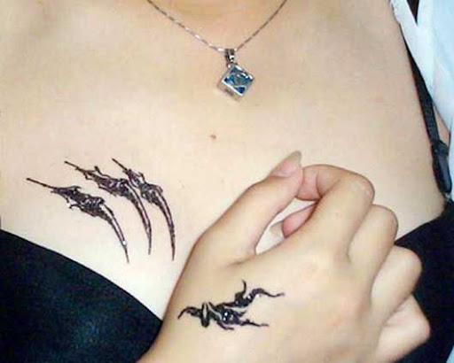 3.Beautiful Women With Chest Tattoo photo With Female Chest Tattoo Designs gallery