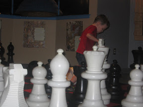 BigE playing with large chess peices