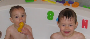 BigE and BigC playing in the tub