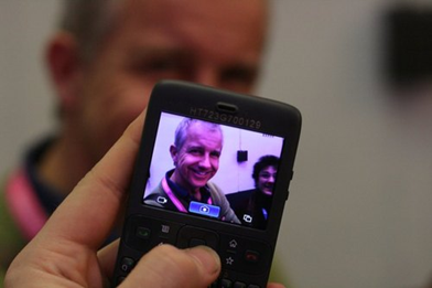 Google Phone (GPhone, G-Phone) making photo of man