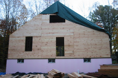 Sheathing up to the collar ties on the back of the house