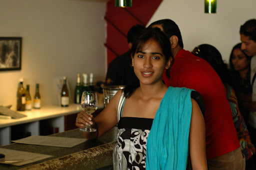 Shilpa with her wine glass