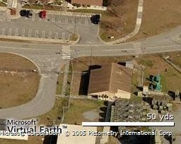 Here's where I work now.  Cool, huh? I'd invite you to come to work with me sometime, but you'd be stopped at the door by a few highly-trained, heavily armed guards just waiting for a chance to kill some babies.  Nah, just kidding.  They'd probably just ask you not to proceed through the door.  