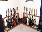 Loading up the racks Oct 2003... L to R: JPM90-HAM, RG1077XL-RB Prestige, UV777-BK Universe, USA Custom Exotic Wood, RG1680x-AM J-Custom, RG1880-BGS J-Custom, Jem90-HAM, RG2680M-DBK Prestige, RG7CT-VV Prestige, RG-ART J-Custom, JPM100-P1, Jem7-VWH, RG2420-TB Prestige, RGT3120-TV Prestige, RG3120-TW Prestige, RG-PR1 Prestige