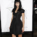 Krysten Ritter totally in Black , from Hair, Dress to Shoes