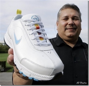 Air Native N7 Sam McCracken, manager of Nike's Native American business program, shows the new Nike Air Native N7 shoe at Nike headquarters in Beaverton, Ore., Tuesday, Sept. 25, 2007.