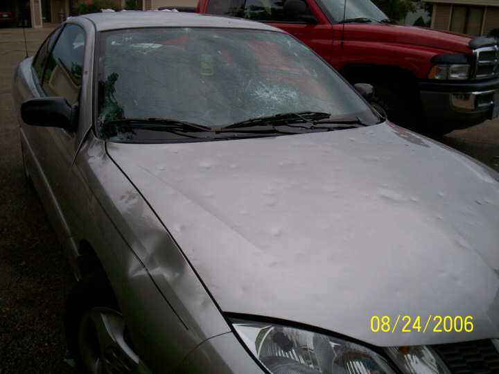 Ice Rain damages cars.