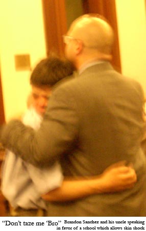 Photo of JRC student Brandon Sanchez in his uncle's arms